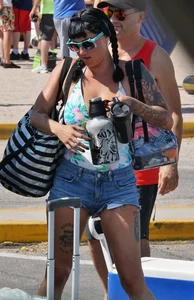 Girls in bikinis getting ready for tubing