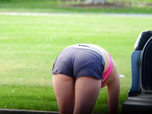 Blonde bending over