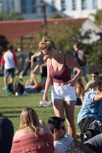 Girl in Shorts and Top in the Park Creepshot