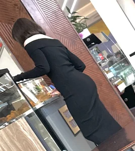 Brunette college girl with a perfect ass in a very tight dress