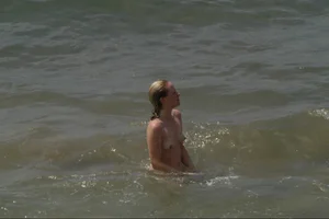 Girls on a nude beach in Sitges, Spain