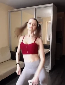 Skinny Girl in a Top and Grey Cameltoe Tights Working Out and Jumping Selfie Video