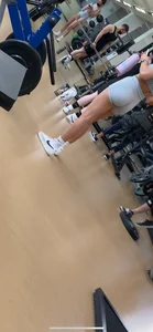 College gym slut in grey spandex shorts