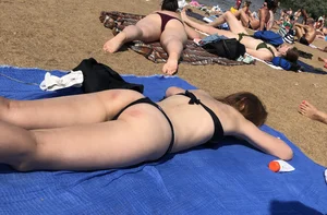 Skinny candid girl lying on the beach creepshots gallery
