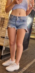 Adorable cute candid teen wearing a top and fringe jean shorts street creepshots, nice tummy and legs