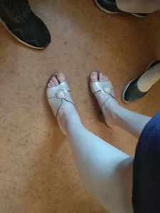 Legs And Feet of a College Teen With Very White Skin Closeup Photo