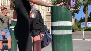 Hottie in spandex booty shorts with a nice ass showing her cheeks and slight camel toe