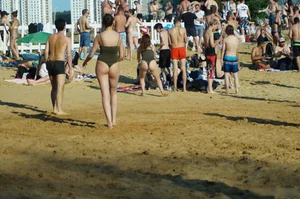 Milf with Amazing Fit Ass in Green One-Piece Swimsuit Playing Volleyball on the Beach Creepshots Gallery