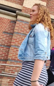 Redhead squeezed into a tight dress
