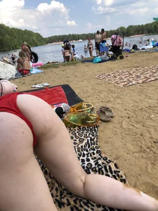 Girl Standing Up on Her Knees Doggy Style at a Beach Photos