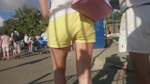 Milf in yellow shorts with vpl and a wedgie