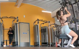 Gym brunette in tight grey shorts