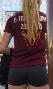 Candid blonde teen's butt in spandex shorts
