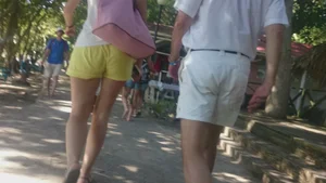 Milf in yellow shorts with vpl and a wedgie