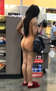 Latina with hard nipples and a big booty in tight spandex shorts outfit