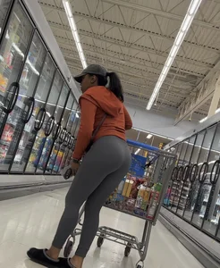 Ebony chick orange sweater + grey leggings