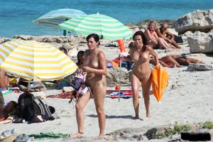 Bunch of sexy ladies on a nude beach