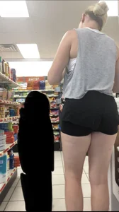 Blonde In Shorts Bending Over