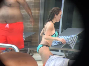 Hot girl at the pool in her bikini with big tits
