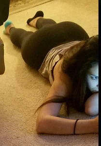 Great ass in tights, candid girl lying on the floor with her phone home creepshot