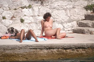 Nude girls on a beach in Hvar, Croatia