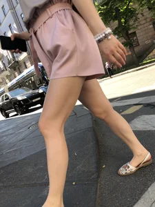 Cute candid girl in pink shorts street photos