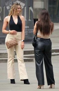 2 girls in jeans & leather pants with nice butts & visible nips
