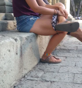 Short, thick crossed legs