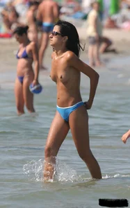 A bunch of sexy beach voyeur babes in bikinis, thongs and topless