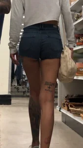 Slim tatted succubus in cheeky jean shorts