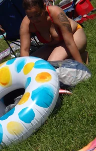 Thick girl with tattoos, big tits and a big booty in a little bikini