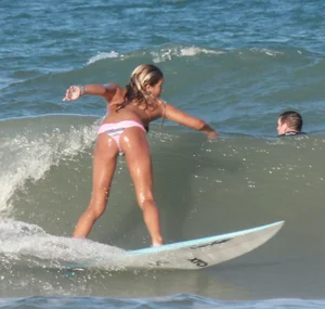 Hot surfer chicks out in the water
