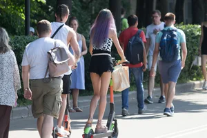 Hot Candid Girls in Mini Shorts on Scooters on the City Street Creepshots