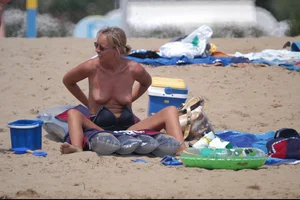 Girls on a nude beach in Bibione, Italy