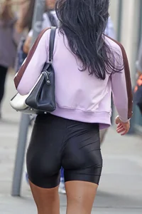 [It’s an older Milf, but it checks out] tight toned body showing off her ass, thigh gap & cameltoe in shiny shorts