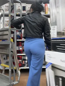 Stocking the shelves in her blues