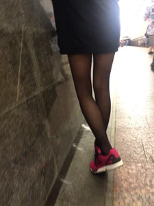 Girl in Black Pantyhose and a Skirt Subway Candid