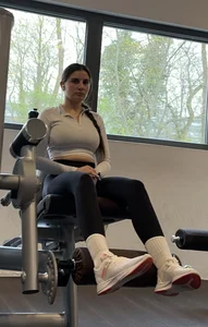 Very Hot GYM Girl with Huge Tits and big Ass looking into Camera