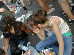 Skinny Flat-Chested Candid Girl Sitting on the Ground, Flashing Her Boob Downblouse Creepshot