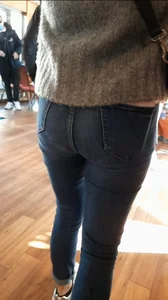 Brunette in tight blue jeans