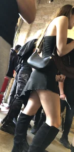 Hot girl in a short dress and knee high boots creepshots
