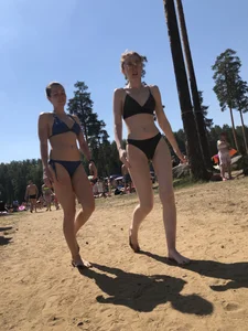 Wet Candid Girls in Swimsuits Walking Out of the Water at the Lake Beach Gallery