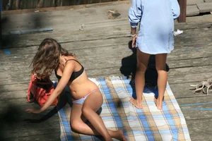 Two teens stripping and going topless to tan