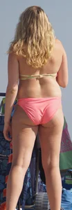 Thick blonde bikini babe on the beach