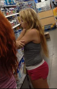 Two Walmart sexy babes in shorts with nice asses