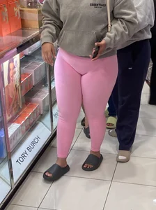 Thick Latina in pink leggings