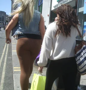 Thick blonde showing her panties in see through leggings