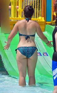 Thick brunette in a bikini while in the pool