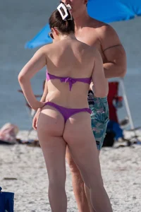Pale chick in tiny purple thong
