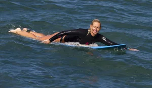 Candid surfer babes on the beach and in bikinis
